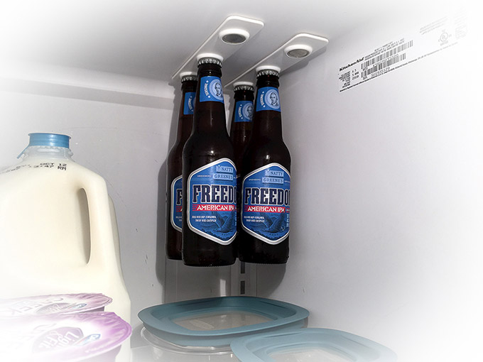 BottleLoft-hangs-your-bottles-on-the-roof-of-your-refrigerator-using-1