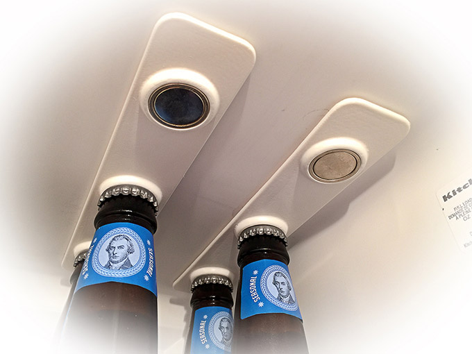 BottleLoft-hangs-your-bottles-on-the-roof-of-your-refrigerator-using-2