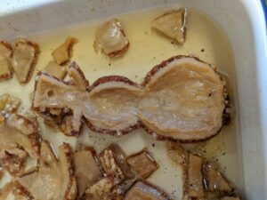 Pork crackling Christmas snowman decoration in a pan